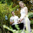 Couple grilling food in the park