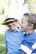 Grandfather and grandson laughing