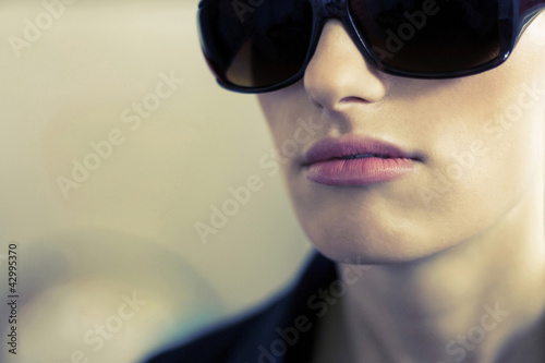 Photo: Woman with sunglasses Woman with sunglasses