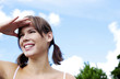 Photo: Woman shielding her eyes with her hand Woman shielding her eyes with her hand