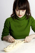 Woman making dough