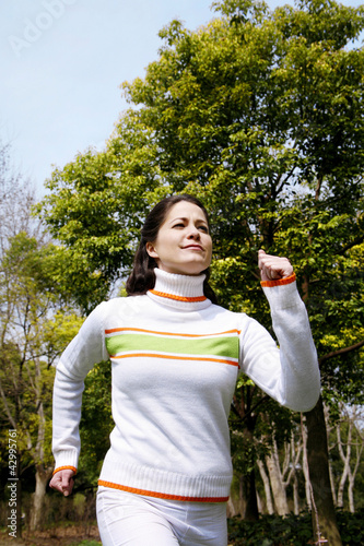 Photo: Woman jogging in the park Woman jogging in the park