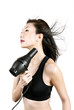Woman blow-drying her hair