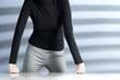 Businesswoman with her knuckles on the table