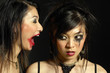 Photo: Woman with smudged lipstick screaming at another woman with smudged mascara Woman with smudged lipstick screaming at another woman with smudged mascara