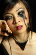 Photo: Woman with smudged mascara Woman with smudged mascara