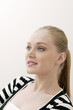Young woman smiling while looking up