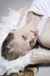 Young woman in white posing for the camera