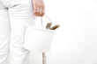 Holding paint bucket with brushes inside