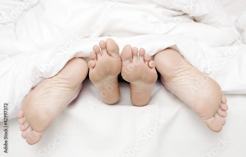 Photo: Couple in bed Couple in bed
