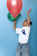 Boy playing balloons