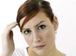 Woman adjusting her hair