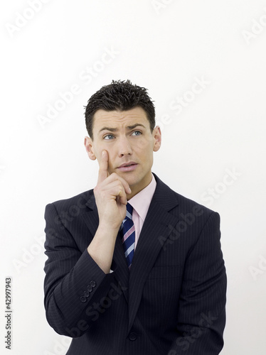 Photo: Businessman contemplating Businessman contemplating