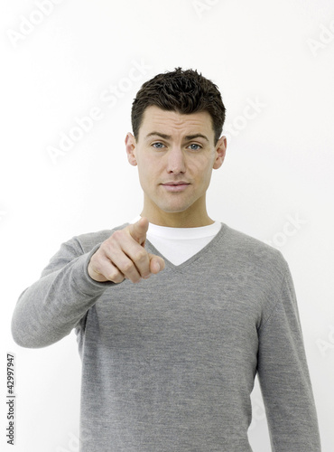 Photo: Man pointing at camera Man pointing at camera