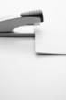 Fastening papers with a stapler