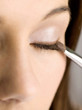 Applying eye shadow