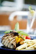 Grilled meat and fries