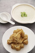 Chinese rice congee with pieces of fried bread sticks