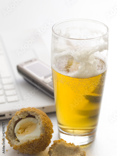 Photo: Lager and scotch egg Lager and scotch egg