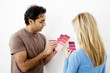 Couple choosing suitable colour from the colour chart