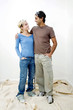 Couple with protection goggles looking at each other