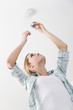 Photo: Woman changing the light bulb Woman changing the light bulb