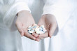 Hands with pills