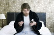 A man holding cough syrup