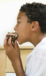 Boy eating cupcake