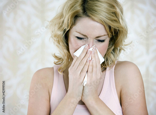 Photo: Woman having a cold Woman having a cold