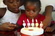Two girls and a birthday cake