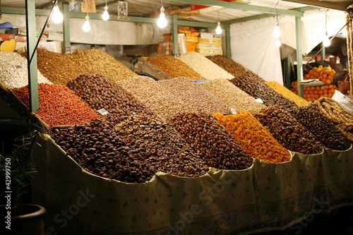 Photo: Dried fruits and nuts on market stall Dried fruits and nuts on market stall