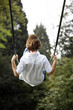 Man sitting on swing