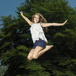 Woman jumping in the air