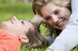 Girls lying on grass 
