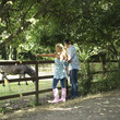Man, woman and boy at a farm