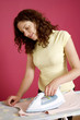 Photo: Woman ironing clothes Woman ironing clothes