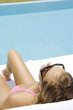 Woman in swimming suit sunbathing