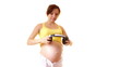 Video: Woman putting headphones on her pregnant belly Woman putting headphones on her pregnant belly