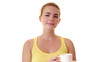 Young woman drinking coffee in studio