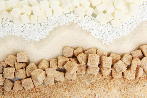 Photo: Sweetener with white and brown sugar close-up Sweetener with white and brown sugar close-up