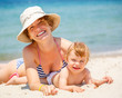 Photo: Mother with little daughter on the beach Mother with little daughter on the beach