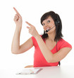 young woman with headset showing something