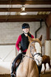 Photo: Teen girl riding horse Teen girl riding horse