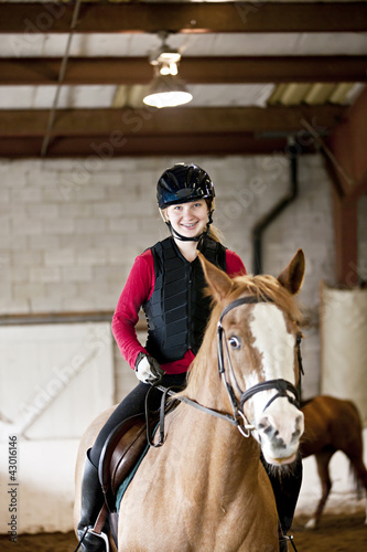 Photo: Teen girl riding horse Teen girl riding horse