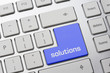 Foto: blaue Taste auf Tastatur: SOLUTIONS blaue Taste auf Tastatur: SOLUTIONS