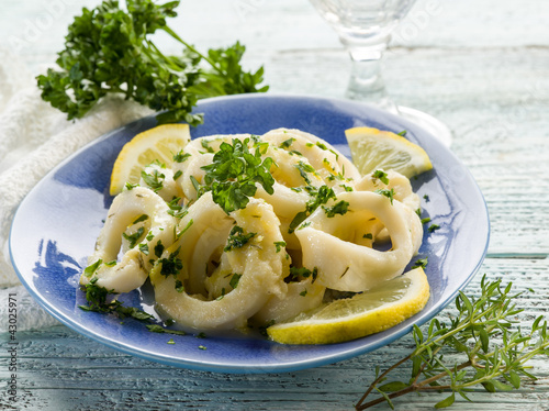 Photo: rings squid with parsley and lemon rings squid with parsley and lemon