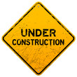 Dirty Under Construction Sign
