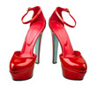 Foto: Beautiful red woman shoes isolated on the white Beautiful red woman shoes isolated on the white