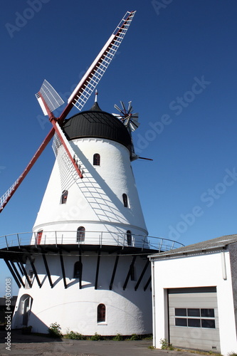 Photo: White windmill on the Danish island Bornholm White windmill on the Danish island Bornholm